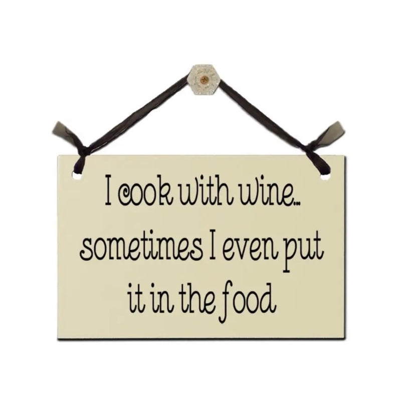 Sign - I cook with wine, sometimes I even put it in the food.