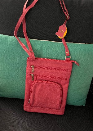 Pink leather cross body purse